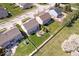 Backyard featuring a stone patio and verdant lawn captured from above at 19546 Forsythe Dr, Noblesville, IN 46060