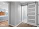 This hallway features a modern barn door leading to the bathroom at 19546 Forsythe Dr, Noblesville, IN 46060