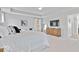 Spacious main bedroom with trey ceilings, and matching sitting chairs at 19546 Forsythe Dr, Noblesville, IN 46060