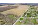 Panoramic aerial shot of a rural landscape, featuring residential areas alongside agricultural land and scattered woodlands at 20892 Overdorf Rd, Noblesville, IN 46062