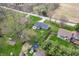 High-angle view showcasing a property with a well-maintained yard, situated among a mix of residential homes and natural surroundings at 20892 Overdorf Rd, Noblesville, IN 46062