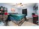 Carpeted bedroom featuring a ceiling fan, wall-mounted TV, and closet for storage at 20892 Overdorf Rd, Noblesville, IN 46062