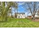 A large, manicured backyard offers privacy and a place to relax or entertain at 24 W Pine Ridge Dr, Westfield, IN 46074