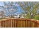 A wooden fence offers privacy to this backyard with beautiful trees at 24 W Pine Ridge Dr, Westfield, IN 46074