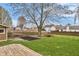 A spacious, well-maintained backyard features a fire pit and a storage shed at 24 W Pine Ridge Dr, Westfield, IN 46074