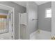 Well-lit bathroom with shower, garden tub, and towel rack at 24 W Pine Ridge Dr, Westfield, IN 46074