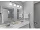 Bathroom featuring double vanity sinks, mirrors, and ample lighting at 24 W Pine Ridge Dr, Westfield, IN 46074