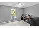 Bedroom with work space, ceiling fan, and view of the outdoors from the window at 24 W Pine Ridge Dr, Westfield, IN 46074