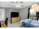 Bedroom featuring a ceiling fan, a full-sized bed, and a large flat screen TV at 24 W Pine Ridge Dr, Westfield, IN 46074
