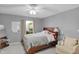 Comfortable bedroom with a ceiling fan, window, and neutral decor at 24 W Pine Ridge Dr, Westfield, IN 46074