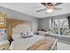 Cozy bedroom with a ceiling fan, desk, and bright natural light at 24 W Pine Ridge Dr, Westfield, IN 46074