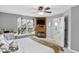 Bright bedroom with a TV, fireplace, and view of the outside at 24 W Pine Ridge Dr, Westfield, IN 46074