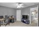 Bedroom featuring a ceiling fan, work space, and carpet flooring throughout at 24 W Pine Ridge Dr, Westfield, IN 46074