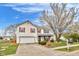 Charming two-story home with a well-maintained lawn and a two car garage with red shutters at 24 W Pine Ridge Dr, Westfield, IN 46074