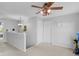 Upstairs hallway with neutral paint, carpet, ceiling fan, and updated lighting fixtures at 24 W Pine Ridge Dr, Westfield, IN 46074