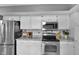 Kitchen featuring stainless steel appliances, ample cabinet space, and durable countertops at 24 W Pine Ridge Dr, Westfield, IN 46074