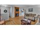 Inviting living room with hardwood floors, a fireplace, and a cozy seating area at 24 W Pine Ridge Dr, Westfield, IN 46074