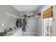 A spacious walk-in closet with shelves and hanging rods provides ample storage space at 24 W Pine Ridge Dr, Westfield, IN 46074