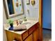Bathroom with a vanity, decorative mirror, and fresh towels, creating a clean and inviting space at 2509 Windsor Ct, Lebanon, IN 46052
