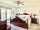 Charming bedroom featuring a wooden bed frame, side tables, and a dresser at 2509 Windsor Ct, Lebanon, IN 46052
