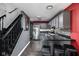 Modern kitchen featuring gray cabinetry, stainless steel appliances, and an island with seating at 253 Provincial Ln # Apt D, Avon, IN 46123