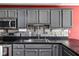 Updated kitchen with gray cabinets, stainless steel appliances, and modern fixtures at 253 Provincial Ln # Apt D, Avon, IN 46123