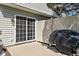 Private patio with sliding glass doors and grill, perfect for outdoor dining and relaxation at 253 Provincial Ln # Apt D, Avon, IN 46123