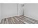 Spacious bedroom boasts neutral paint, modern flooring, and natural light at 2531 E Brookside Ave, Indianapolis, IN 46218
