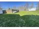 A large propane tank is located in the manicured backyard, in addition to a shed at 2575 S Indianapolis Rd, Lebanon, IN 46052