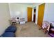 Bedroom showcasing bean bag chairs, a doll on a rocking chair, and natural light at 2575 S Indianapolis Rd, Lebanon, IN 46052