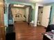 Large bonus room featuring a bed, closet, bathroom and wood floors throughout at 2575 S Indianapolis Rd, Lebanon, IN 46052