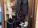 Walk-in closet with ample storage, wire shelving, and various clothing items at 2575 S Indianapolis Rd, Lebanon, IN 46052