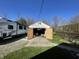 Garage and additional parking alongside the house, suitable for vehicle storage and maintenance at 2575 S Indianapolis Rd, Lebanon, IN 46052