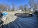 Above ground pool featuring an aged wood deck and safety fence surround the area at 2575 S Indianapolis Rd, Lebanon, IN 46052