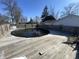 Above ground pool featuring an aged wood deck and safety fence surround the area at 2575 S Indianapolis Rd, Lebanon, IN 46052