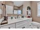 Well-lit bathroom featuring a white vanity, framed mirror, and neutral wall color creating a calming atmosphere at 2601 Viceroy Ln, Lebanon, IN 46052