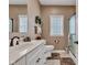Bathroom featuring a single vanity, toilet, shower, and window with blinds for natural light at 2601 Viceroy Ln, Lebanon, IN 46052