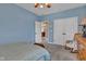 Bedroom featuring plush carpeting, a bed with patterned linens, and ample natural light at 2601 Viceroy Ln, Lebanon, IN 46052