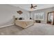 Spacious bedroom with a large window, neutral colors, and a decorative accent wall at 2601 Viceroy Ln, Lebanon, IN 46052