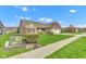 Well-maintained home with a lush green lawn and mature landscaping at 2601 Viceroy Ln, Lebanon, IN 46052