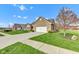 Beautiful brick home showcasing a pristine lawn, mature trees, and a long driveway at 2601 Viceroy Ln, Lebanon, IN 46052