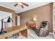 Inviting home office featuring a desk, leather chair, and ample natural light at 2601 Viceroy Ln, Lebanon, IN 46052
