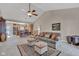 Large living space with vaulted ceiling and views of dining room and kitchen at 2601 Viceroy Ln, Lebanon, IN 46052