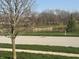 Scenic view of pond and green space, across the street in a tranquil neighborhood at 2601 Viceroy Ln, Lebanon, IN 46052
