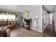 Open living room with neutral paint, vinyl floors, sofas, and decorative accents at 3021 Midvale Dr, Indianapolis, IN 46222