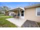 Outdoor patio features a table and chairs with a retractable awning at 3021 Midvale Dr, Indianapolis, IN 46222