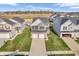 This two-story home boasts a manicured lawn and convenient two-car garage at 3053 Creekridge Ct, Columbus, IN 47201