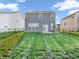 Fenced backyard featuring green grass and a patio with outdoor seating at 3053 Creekridge Ct, Columbus, IN 47201