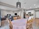Open-concept living space featuring kitchen island, dining area, living room, and seamless flow throughout the home at 3053 Creekridge Ct, Columbus, IN 47201