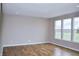 Spacious living room featuring beautiful wood floors and plenty of natural light at 3078 Creekridge Ct, Columbus, IN 47201